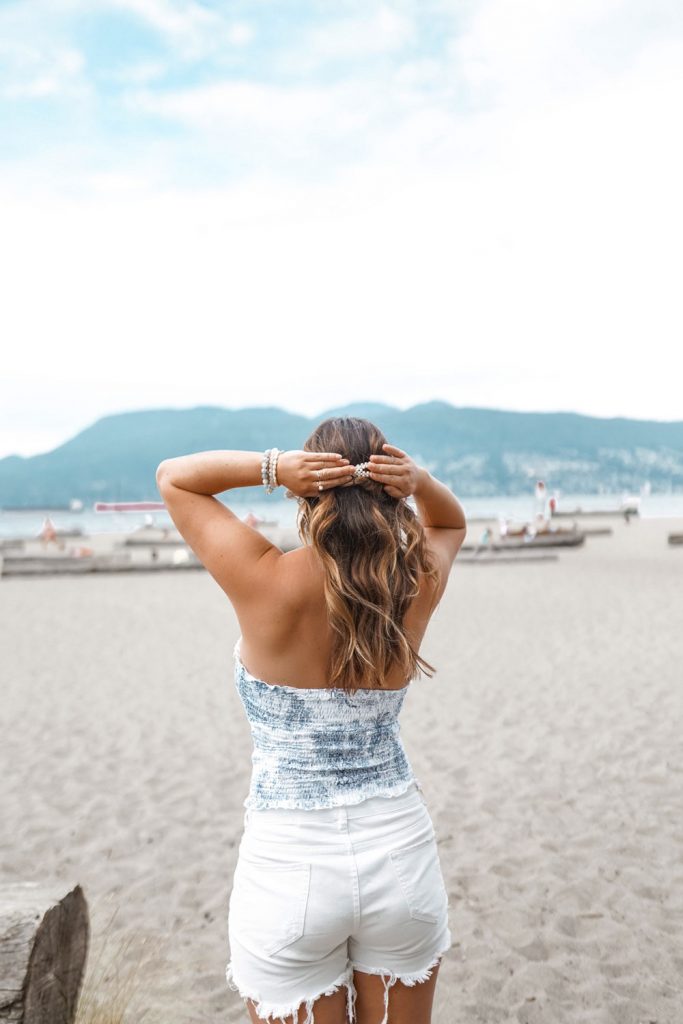 This simple yet chic hairstyle, styled by To Vogue Or Bust is the perfect go-to hairstyle for weddings.