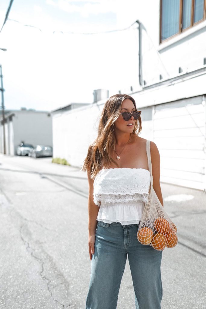 Perfect easy summer-ready cropped jeans outfit idea in Mavi Romee cropped jeans paired with a white crop top and nude Ted Baker pumps, styled by To Vogue or Bust.