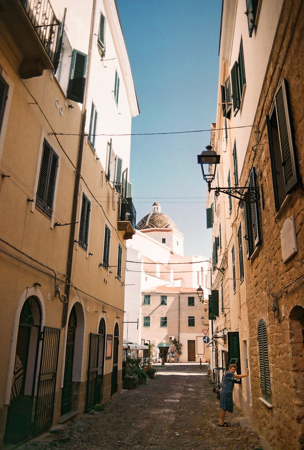 Cobbled streets and historic architecture in Alghero’s old town