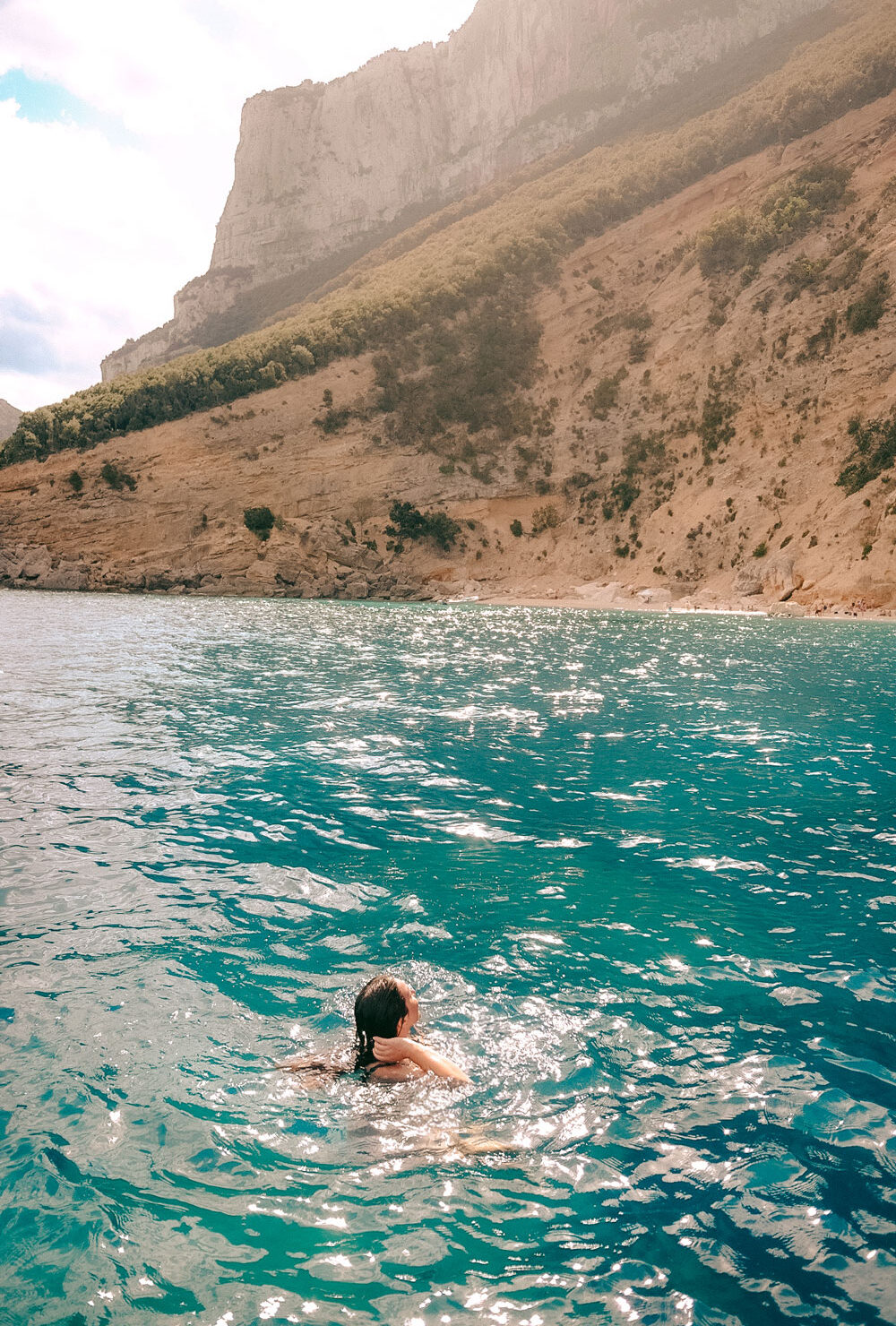 Turquoise waters and rugged coastline near Baunei, Sardinia