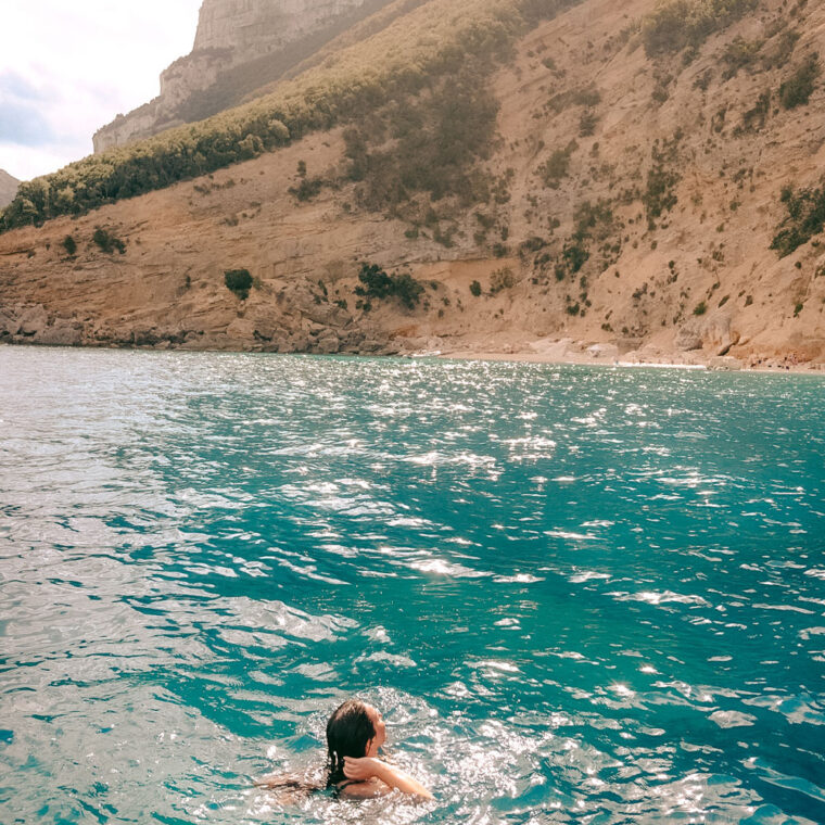 Turquoise waters and rugged coastline near Baunei, Sardinia
