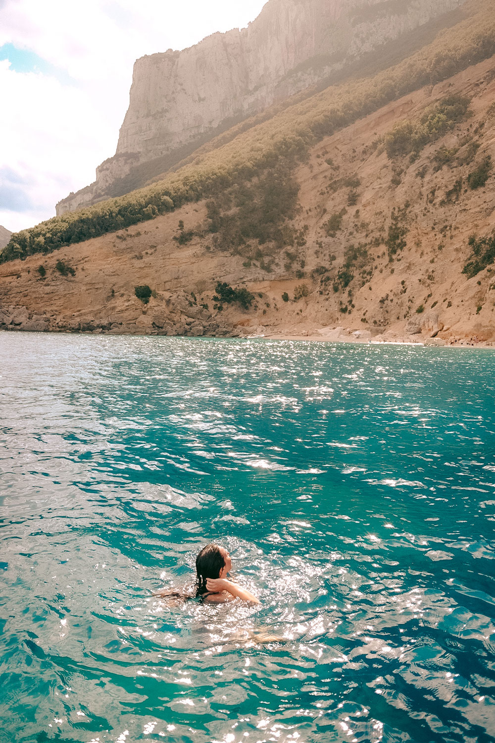 Turquoise waters and rugged coastline near Baunei, Sardinia