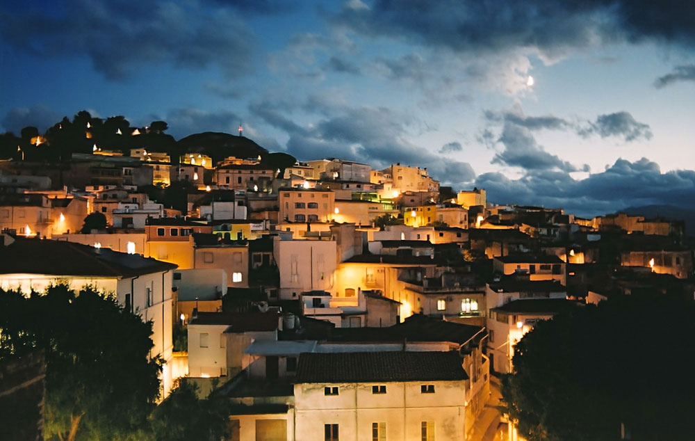 Traditional stone buildings and narrow streets in Dorgali, Sardinia