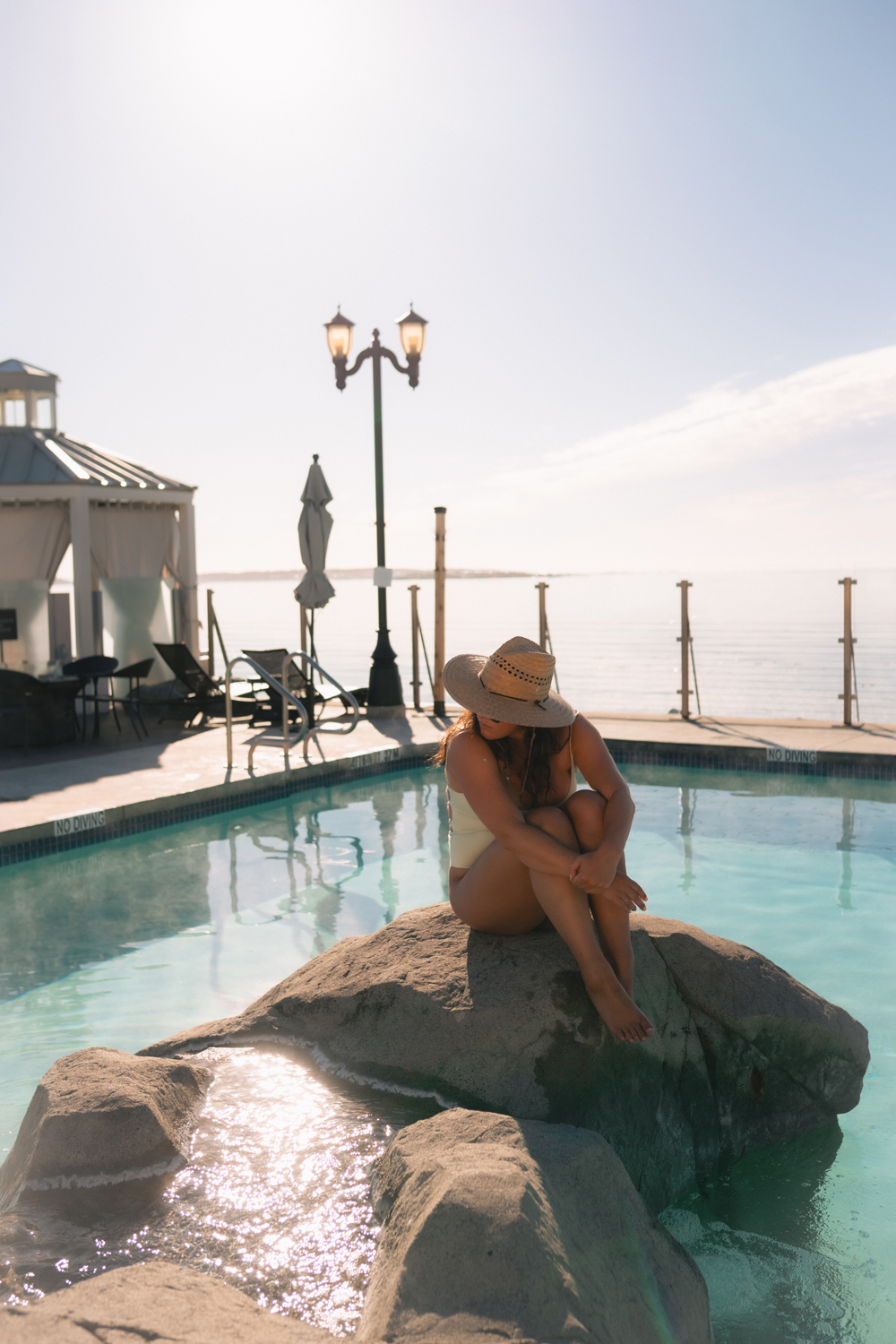 Sisters relaxing in the oceanfront mineral pools at Oak Bay Beach Hotel