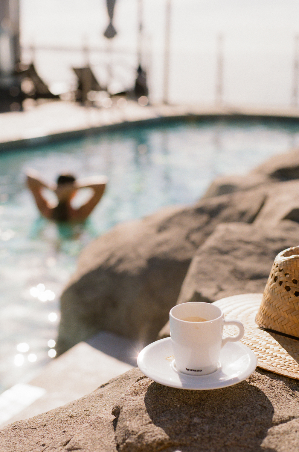 Coffee beside the oceanfront pool at Oak Bay Beach Hotel