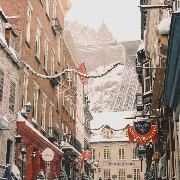 Narrow snow-covered street in Old Québec City in winter