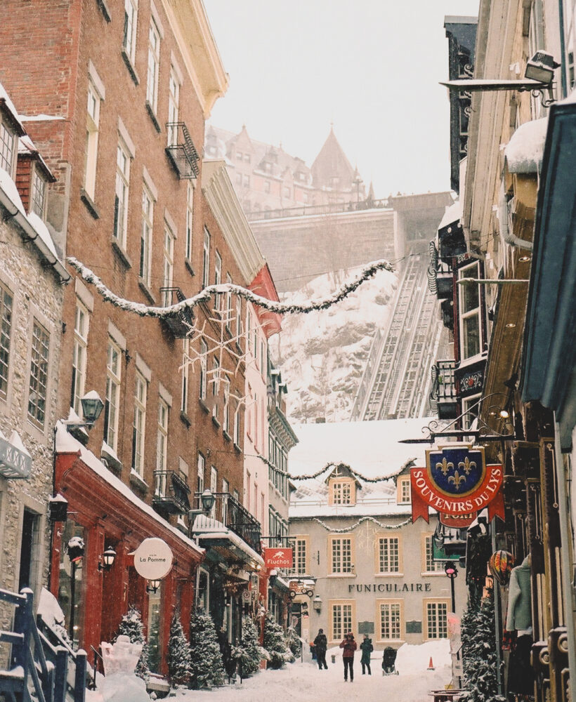 Narrow snow-covered street in Old Québec City in winter
