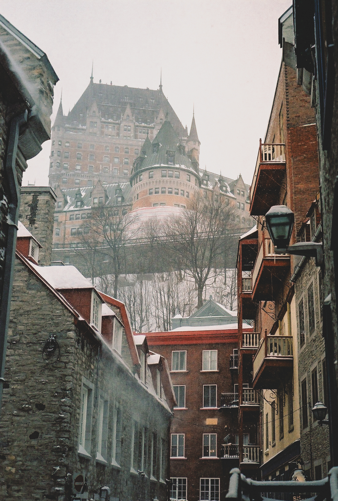 Snow-covered rooftops and historic architecture in Old Québec
