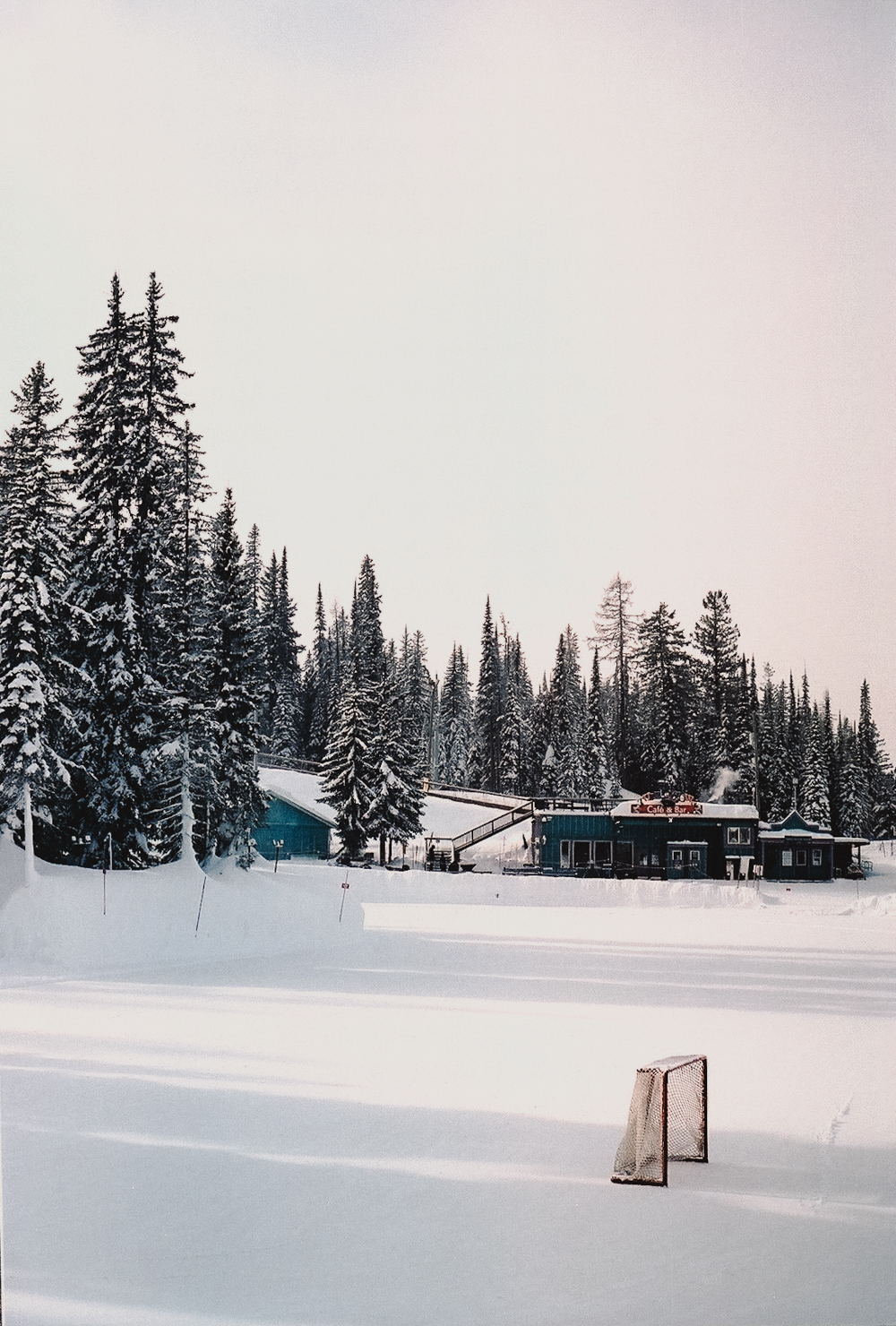 Quiet snow-covered landscape surrounded by evergreen trees at SilverStar