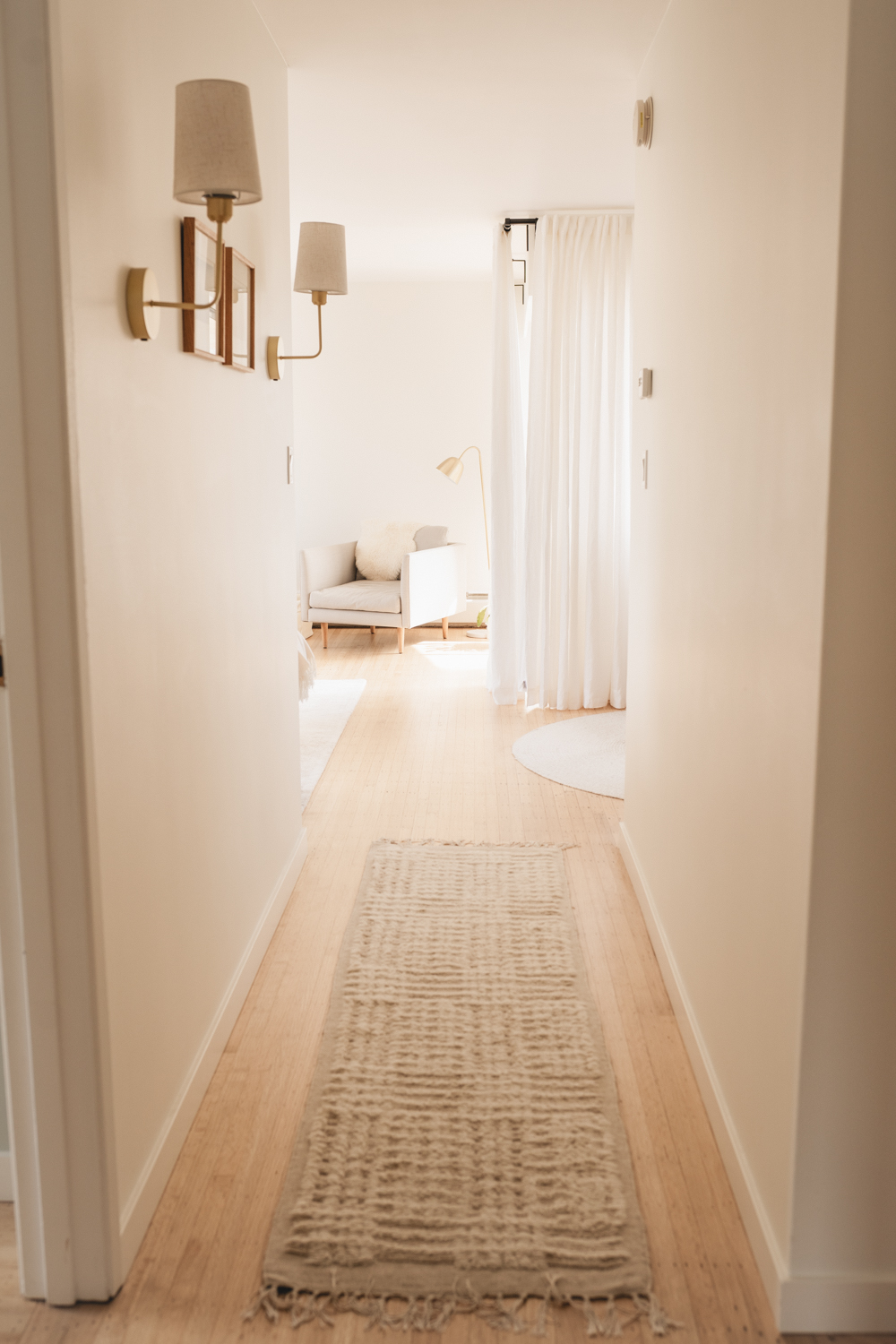 Bright finished hallway after professional residential interior painting in Vancouver