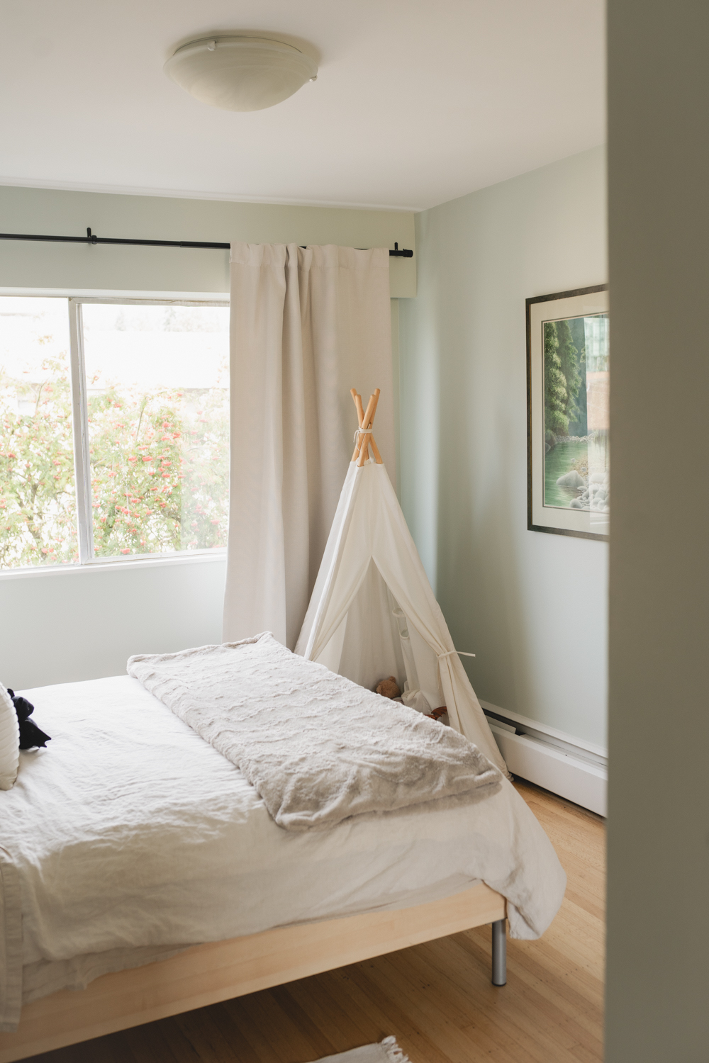 Relaxed bedroom with freshly painted walls after a Vancouver home painting project