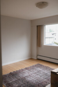 Bedroom before a residential interior painting refresh in Vancouver
